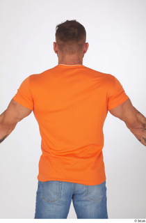 Garrott casual dressed orange t shirt upper body 0005.jpg